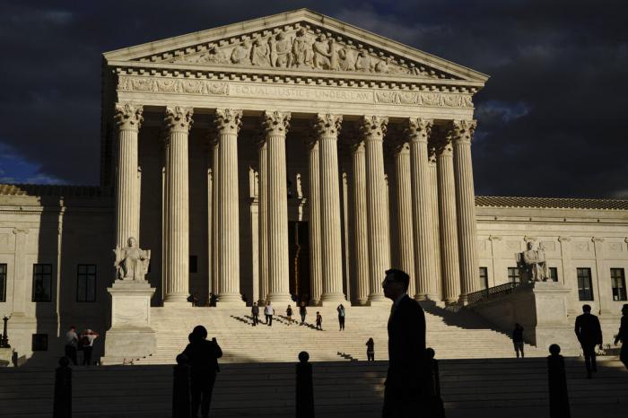 The U.S Supreme Court building is seen at dusk in Washington.