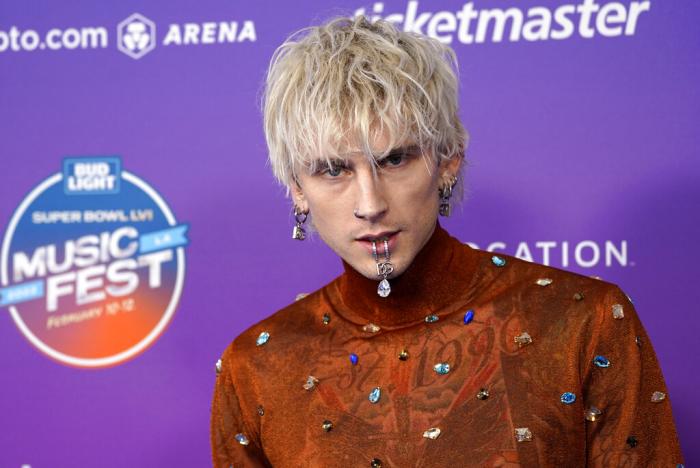 Machine Gun Kelly arrives at day one of the Bud Light Super Bowl Music Fest.