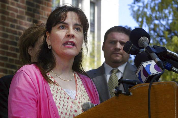 Lisa Miller answers questions about her custody battle during a news conference immediately following arguments for her case before the court at the State Capitol, April 17, 2008, in Richmond, Va.