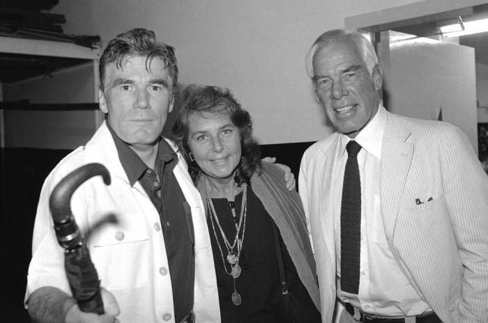 Actor Lee Marvin, right, and his wife, Pamela, visit with Mitchell Ryan, star of Arthur Miller's play "The Price," backstage at the Playhouse Theater in New York in July 1979.