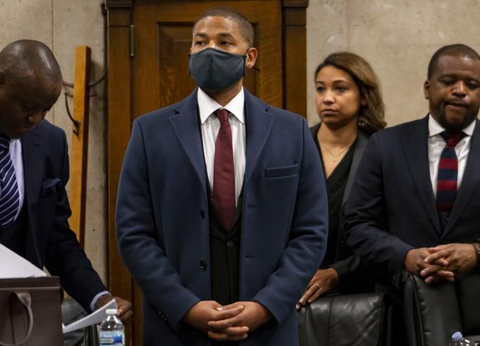 Actor Jussie Smollett appears with his attorneys at his sentencing hearing at the Leighton Criminal Court Building in Chicago. 