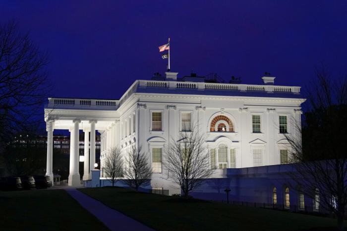 Dusk settles over the White House in Washington,.