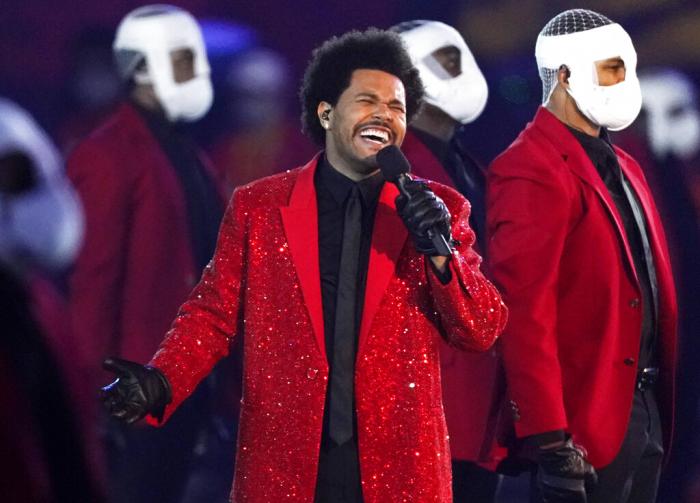 The Weeknd performs during the halftime show of the NFL Super Bowl 55 football game.
