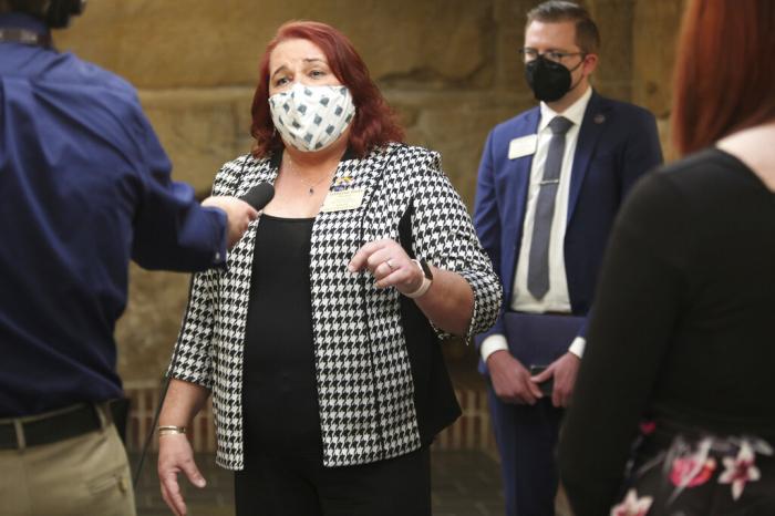 Kansas state Rep. Stephanie Byers, D-Wichita, speaks to reporters Feb. 23, 2021, at the Statehouse in Topeka, Kan.