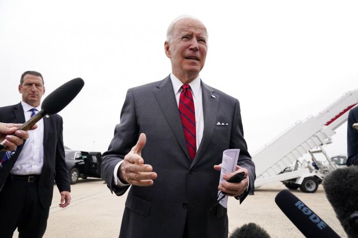 President Joe Biden speaks to the media before boarding Air Force One for a trip to Alabama.