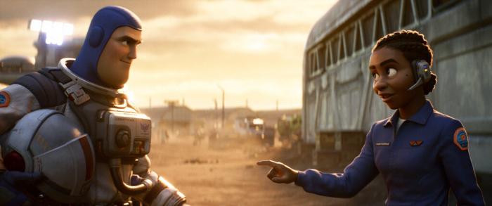 Buzz Lightyear, voiced by Chris Evans, left, and Alisha Hawthorne, voiced by Uzo Aduba, in a scene from the animated film "Lightyear."