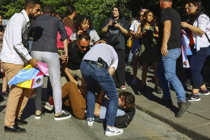 Protesters clash with Turkish police officers during the LGBTQ Pride March in Ankara, Turkey.