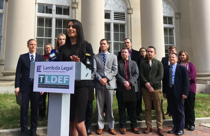 Lambda Legal lawyer Taylor Brown addresses reporters on March 11, 2019, in Durham, N.C., to announce a lawsuit arguing that North Carolina's health plan for state employees discriminates by not covering hormone treatment and surgery for transgender people. 