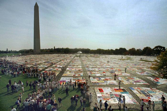 People visit the 21,000 panel Names Project AIDS Memorial Quilt in Washington on Saturday, Oct. 10, 1992.