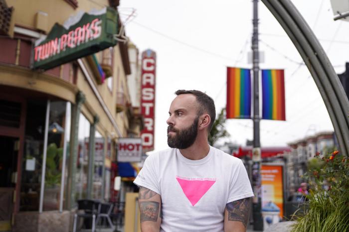 Tom Temprano poses in the Castro neighborhood of San Francisco.