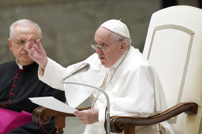 Pope Francis delivers his message during the weekly general audience at the Vatican.