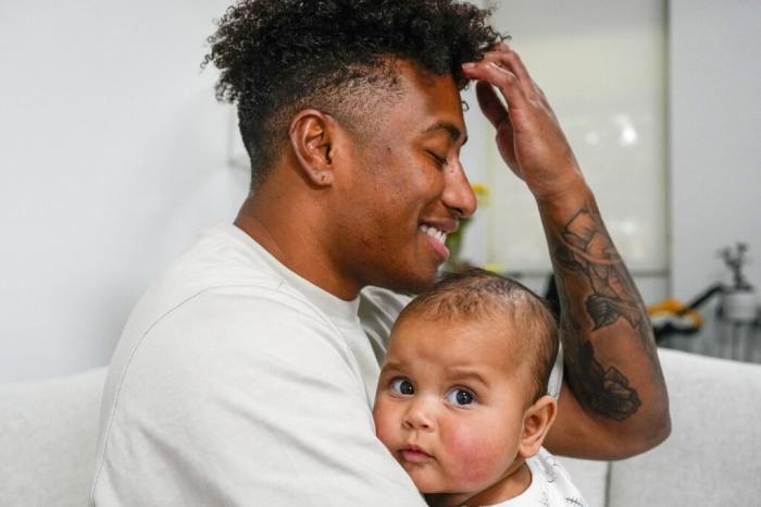 Ellia Green is pictured with his daughter Waitui in Sydney, Australia