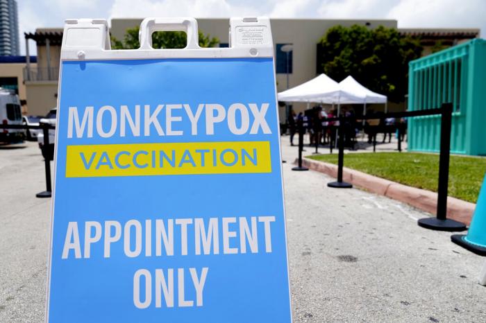 A sign for monkeypox vaccinations is shown at a vaccination site, Wednesday, Aug. 10, 2022, in Miami Beach, Fla.