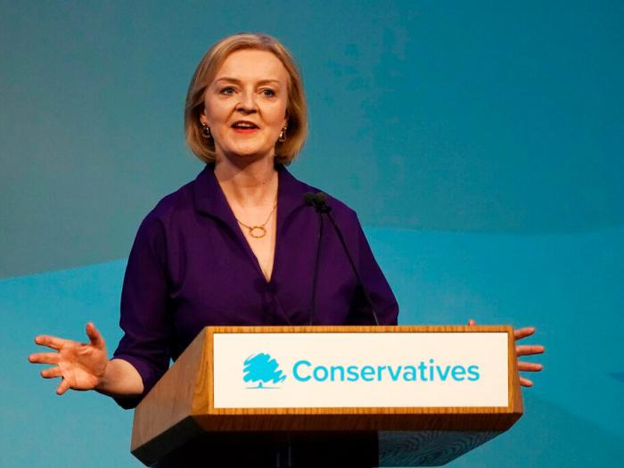 British lawmaker Liz Truss speaks after winning the Conservative Party leadership contest at the Queen Elizabeth II Centre in London, Monday, Sept. 5, 2022. 