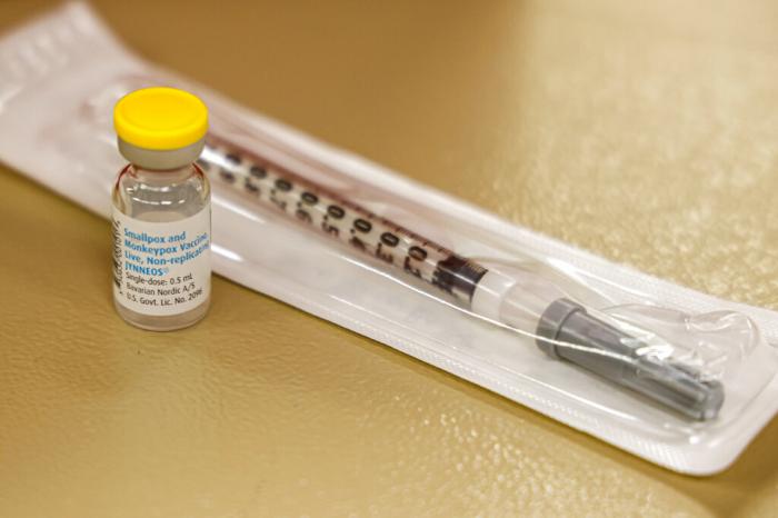 A vial containing the monkeypox vaccine and a syringe is set on the table at a vaccination clinic run by the Mecklenburg County Public Health Department in Charlotte, N.C.