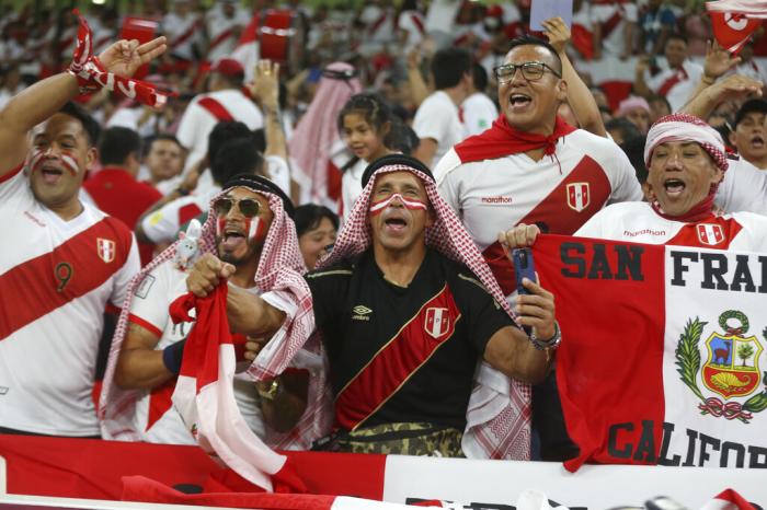 Peru fans cheer before the World Cup 2022 qualifying play-off soccer match between Australia and Peru in Al Rayyan, Qatar.