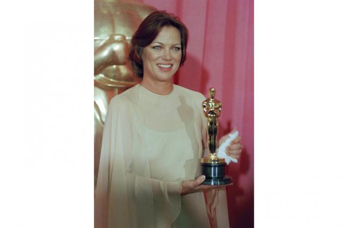 Louise Fletcher holds the Academy Award she won for her leading role in "One Flew Over The Cuckoo's Nest" in Los Angeles, March 30, 1976.