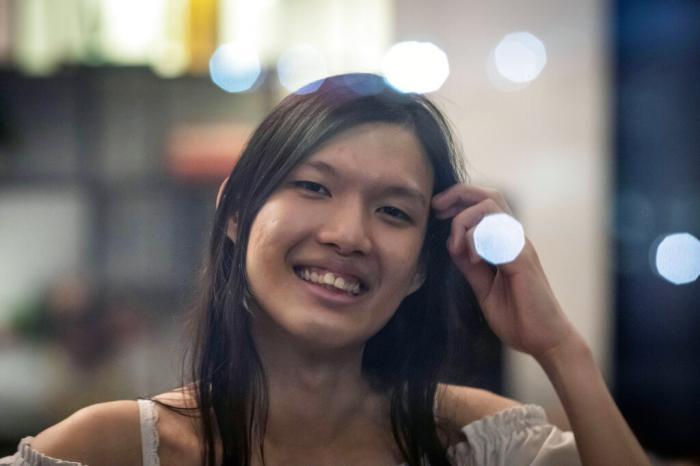 Lune Loh, 25, a transgender woman, poses for a portrait in Singapore, on Thursday, Aug. 18, 2022.