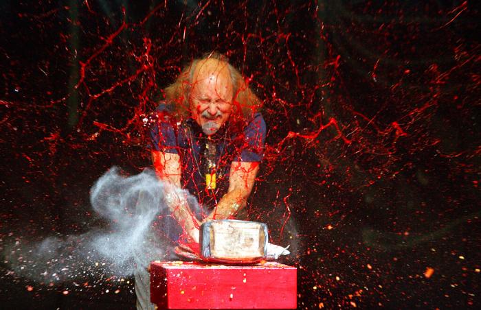 Comedian Gallagher smashes strawberry syrup and flour at the end of his performance at the Five Flags Theater in Dubuque, Iowa on In this Nov. 18, 2006.