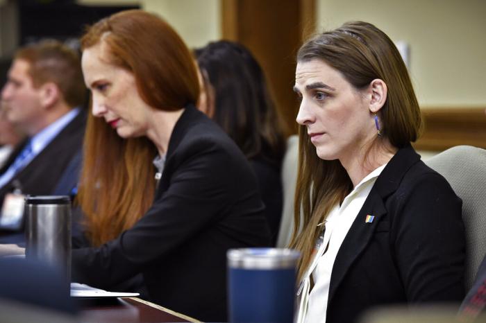 Zooey Zephyr, right, attends a legislative training session at the state Capitol in Helena, Mont.