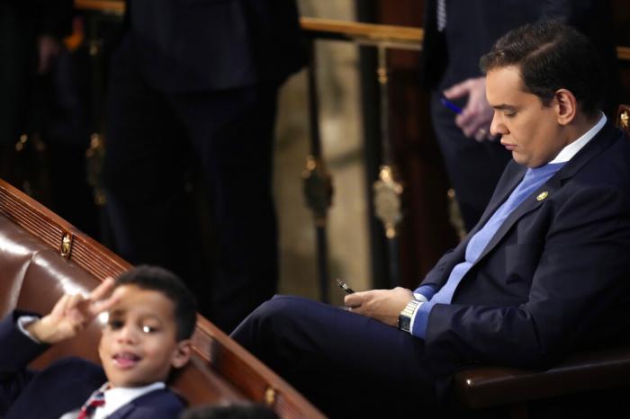 Rep.-elect George Santos, R-N.Y. sits in the chamber during opening day of the 118th Congress at the U.S. Capitol, Tuesday, Jan 3, 2023, in Washington.