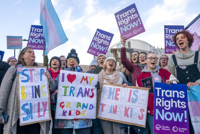 Supporters of the Gender Recognition Reform Bill (Scotland) take part in a protest outside the Scottish Parliament, ahead of a debate on the bill, in Edinburgh. Tuesday, Dec. 20, 2022. 