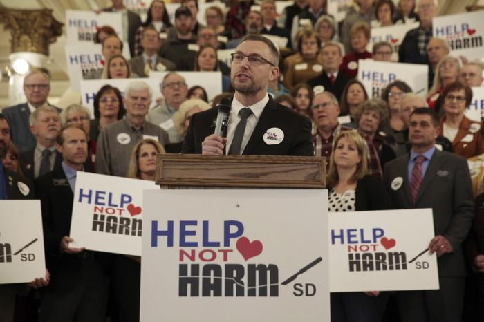 South Dakota Republican Rep. Jon Hansen speaks during a news conference at the state Capitol.