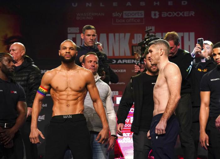 Britain's Chris Eubank Jr, left and Liam Smith look on, during the weigh-in ahead of their middleweight bout on Saturday, at the Manchester Central Convention Complex, Manchester, England.