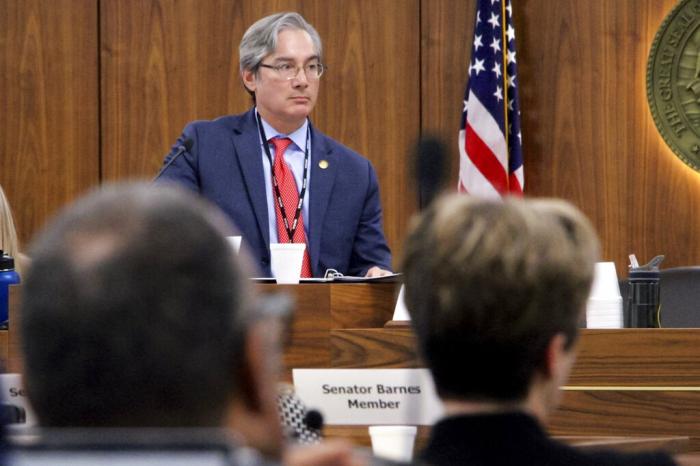 North Carolina state Sen. Michael Lee, a New Hanover County Republican and education committee co-chair, takes questions from lawmakers about a bill seeking to restrict K-4 educators from teaching about LGBTQ topics induring a committee meeting at the Legislative Office Building in Raleigh, N.C.