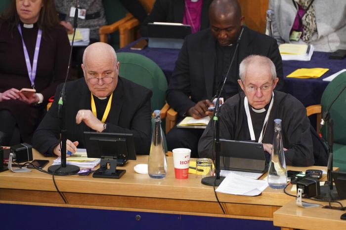 The Archbishop of York, Stephen Cottrell, left and The Archbishop of Canterbury, Justin Welby, gather at the General Synod of the Church of England.