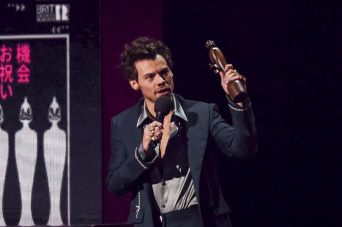 Harry Styles on stage accepting the award for Artist of the Year at the Brit Awards 2023 in London.