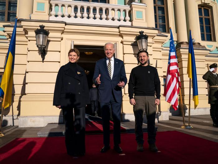 President Joe Biden, center, poses with Ukrainian President Volodymyr Zelenskyy, right, and Olena Zelenska, left, spouse of President Zelenskyy, at Mariinsky Palace during an unannounced visit in Kyiv, Ukraine, Monday, Feb. 20, 2023. (AP Photo/Evan Vucci, Pool)