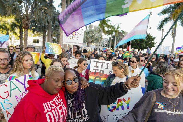 lorida House Representative Michele Rayner, left, hugs her spouse, Bianca Goolsby, during a march at City Hall in St. Petersburg, Fla., Saturday, March 12, 2022, to protest the controversial "Don't Say Gay" bill.