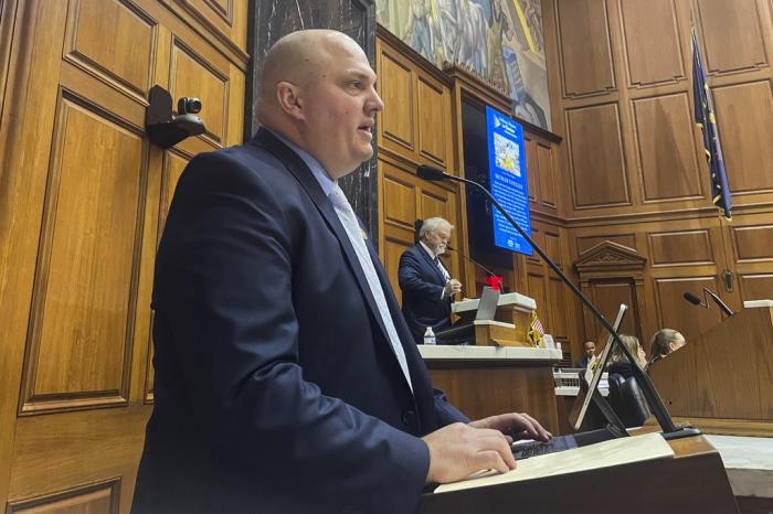 Indiana state Sen. Tyler Johnson speaks on his bill that would ban gender-affirming care for minors before a House public health committee in the Indiana Statehouse on March 21, 2023, in Indianapolis.
