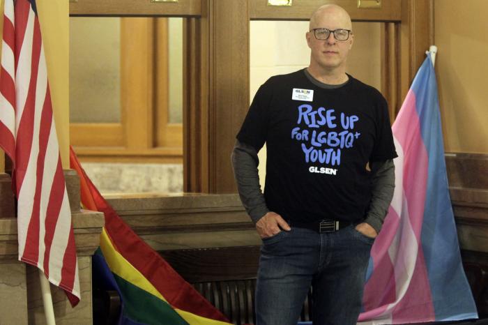 Will Rapp, the Kansas state managing director for GLSEN, a group that supports LGBTQ youth, poses for a photo during a day of lobbying at the Kansas Statehouse, Tuesday, March 28, 2022, in Topeka, Kan. 