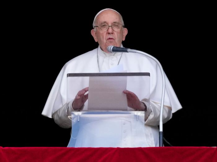 Pope Francis delivers his speech as he recites the Regina Coeli noon prayer from the window of his studio overlooking St.Peter's Square, at the Vatican, Sunday, April 16, 2023. (AP Photo/Andrew Medichini)
