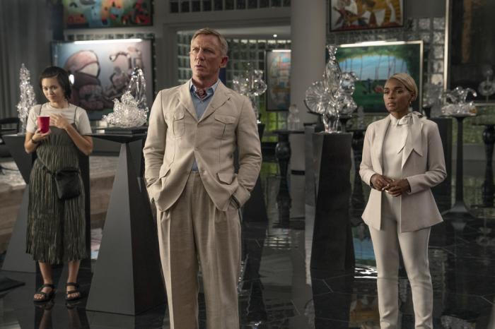 Jessica Henwick, left, Daniel Craig, center, and Janelle Monáe in a scene from "Glass Onion: A Knives Out Mystery."