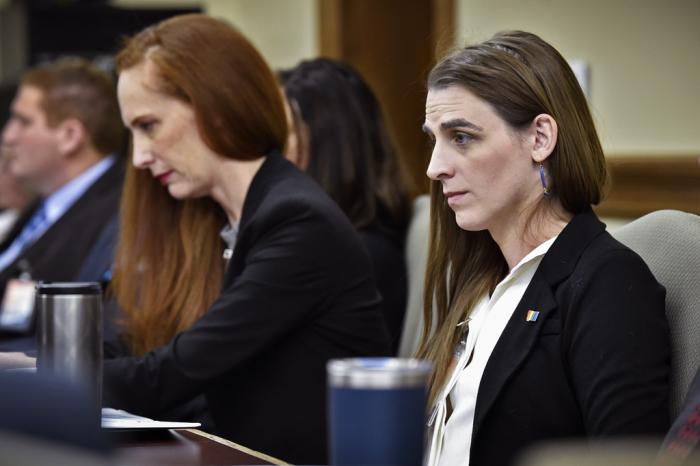 Zooey Zephyr, right, attends a legislative training session at the state Capitol in Helena, Mont., on Nov. 16, 2022. 