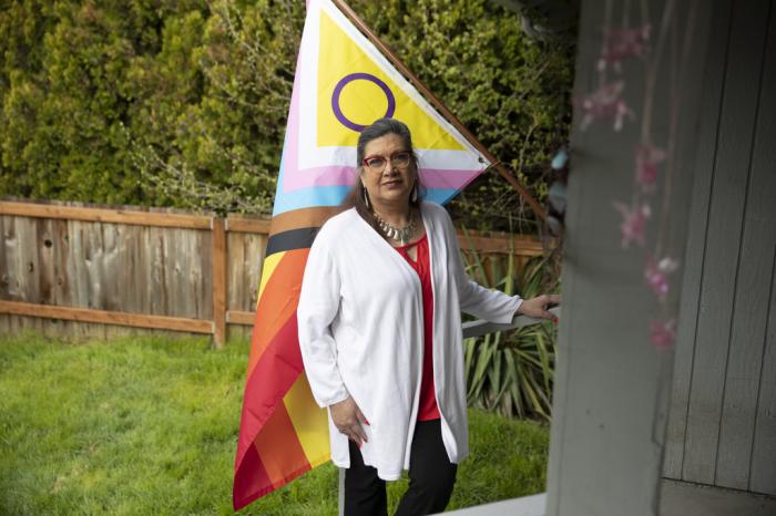 Christina Wood stands for a portrait at her home in Salem, Ore.