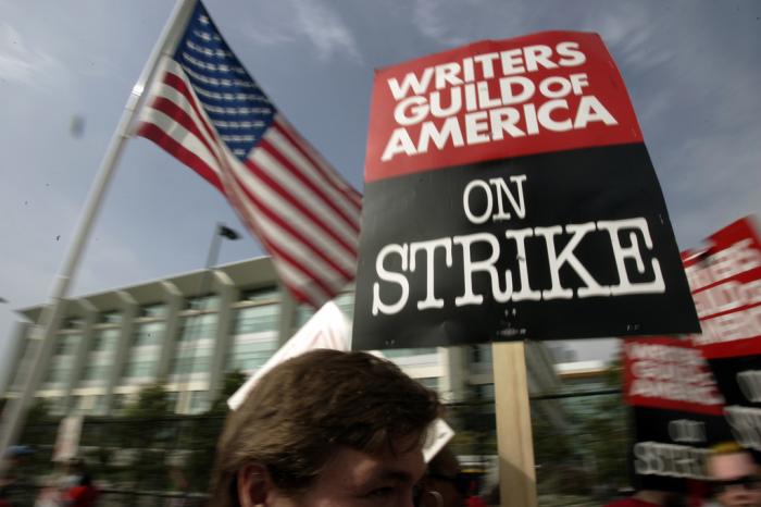 Writers Guild of America (WGA) writers and others strike against the Alliance of Motion Picture and Television Producers (AMPTP) in a rally at Fox Plaza in Los Angeles' Century City district on Nov. 9, 2007. 