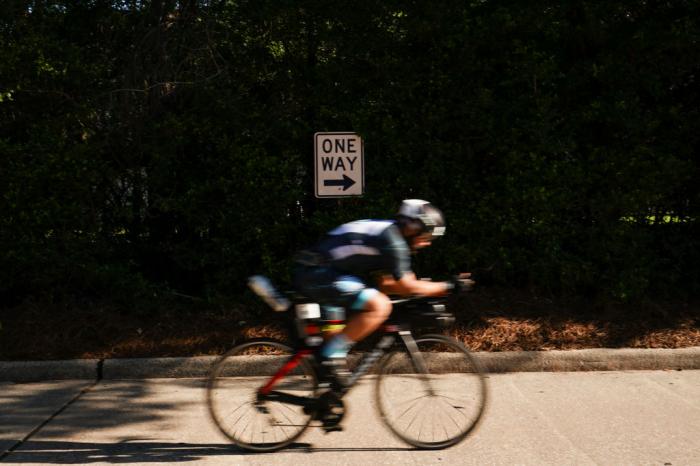 Athletes compete in the bike leg of IRONMAN Texas on April 22, 2023 in The Woodlands, Texas.
