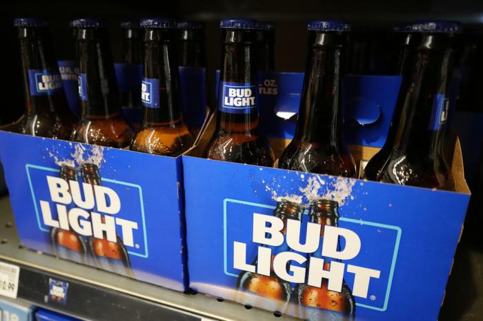 Bottles of Bud Light beer sit on a shelf at a grocery store on April 25, 2023, in Glenview, Ill.