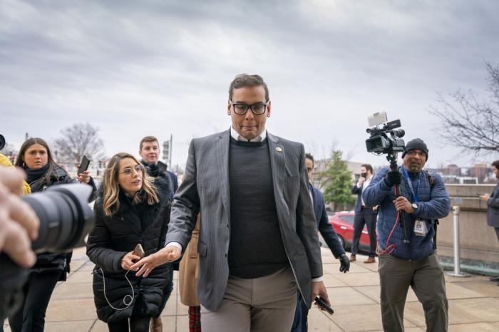 Rep. George Santos, R-N.Y., leaves a House GOP conference meeting on Capitol Hill in Washington, Jan. 25, 2023.
