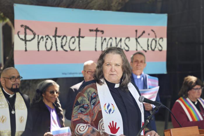 The Rev. Pat Langlois, senior pastor of MCC Church of Christ of the Valley, speaks at an interfaith rally in Pasadena, Calif., on March 31, 2023, protesting the wave of anti-transgender bills being enacted in numerous Republican-governed states. 