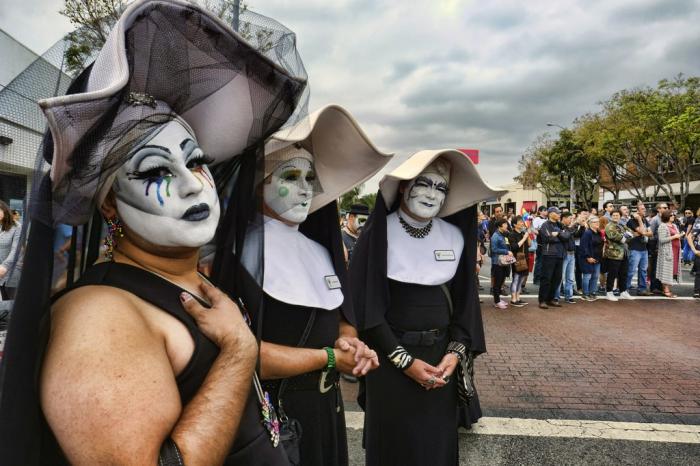 Members of the Sisters of Perpetual Indulgence attend a gay Pride parade in West Hollywood, Calif., on Sunday, June 12, 2016.