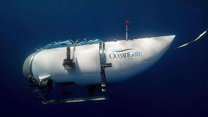 This photo provided by OceanGate Expeditions shows a submersible vessel named Titan used to visit the wreckage site of the Titanic. The wrecks of the Titanic and the Titan sit on the ocean floor, separated by 1,600 feet (490 meters) and 111 years of history. 