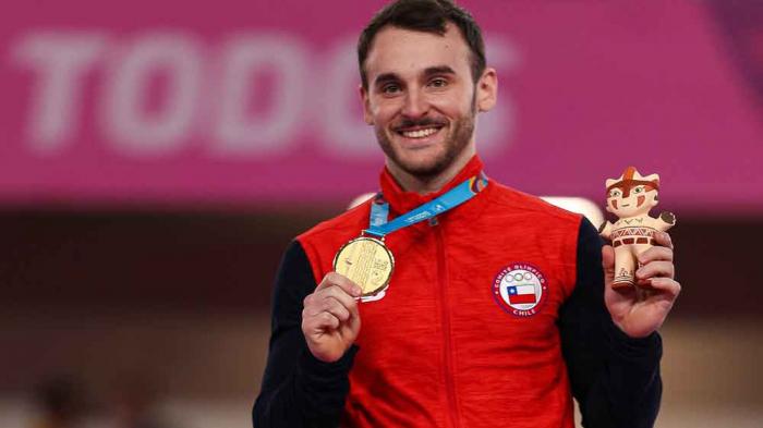 Tomás González of Chile stands in the podium of Men's Floor Exercise as part Men's gymnasticsat Polideportivo Villa El Salvador on Day 4 of Lima 2019 Pan American Games on July 30, 2019 in Lima, Peru. (Photo by Buda Mendes/Getty Images)
