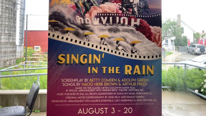 A poster for the Weston Theater Company's production of "Singin' in the Rain" hangs in the company's smaller Walker Farm venue, Aug. 16, 2023, in Weston, Vt.