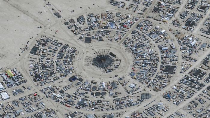 In this satellite photo provided by Maxar Technologies, an overview of Burning Man festival in Black Rock, Nev on Monday, Aug. 28, 2023. (©2023 Maxar Technologies via AP)