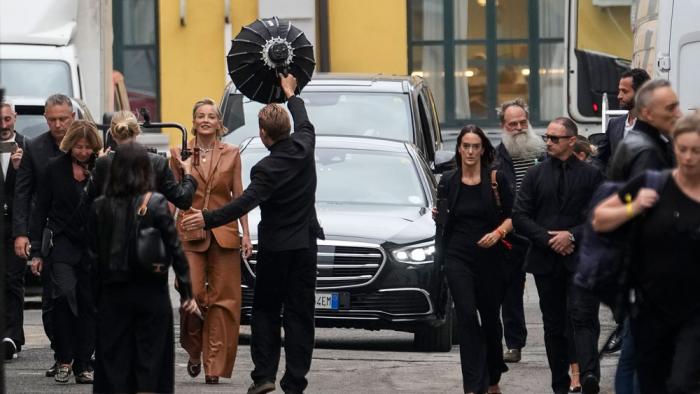 Sharon Stone, centre left, arrives for the Tod's women's Spring Summer 2024 collection presented in Milan, Italy, Friday, Sept. 22, 2023. (AP Photo/Luca Bruno)